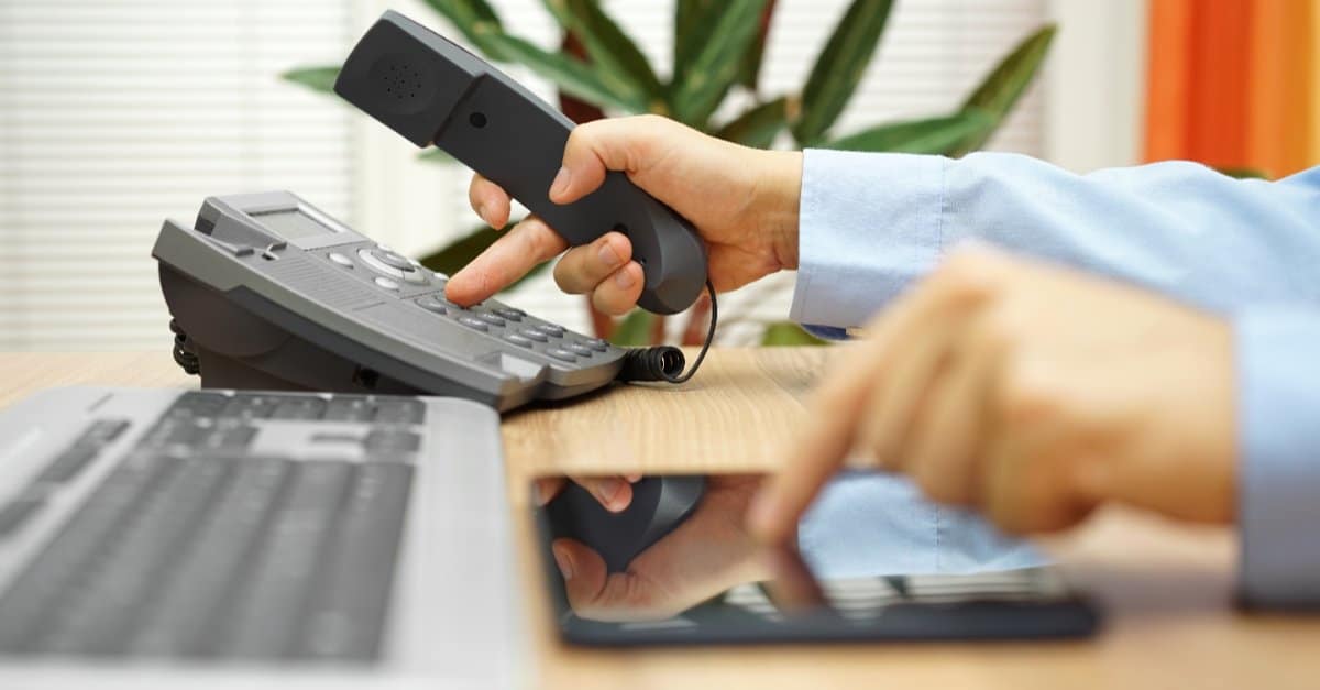 man holding tv remote